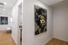Interior hallway featuring wood-finish flooring and recessed lighting