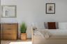 Neutral wall palette with wood-finish flooring