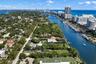 Waterfront property featuring deep-water access, a private dock, and an expansive lawn