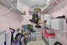 Storage space featuring wall-mounted wire shelving units