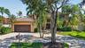 BRAND NEW tile roof, arched entryway, and 2-car garage circular driveway