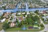 Aerial view showing the full lot depth, nearby Intracoastal and neighboring park.