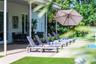 Covered patio featuring a concrete floor, recessed ceiling fan, and access to the grounds via double glass doors