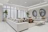 Floor-to-ceiling windows with floor-length drapery, recessed tray ceiling with integrated perimeter lighting, expansive large-format polished flooring
