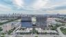 Aerial perspective of high-rise structures featuring glass-paneled facades and architectural exterior design