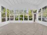 Sunny and private florida room surrounded by nature. Great home for rent in Coconut Grove in Miami, FL. Enjoy large fenced yard, updated home in the N
