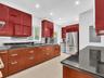 Stylish Poggenpohl kitchen with stainless steel appliances in home for rent in Coconut Grove in Miami, FL. Updated rental in Natoma Manors has 24/7 po