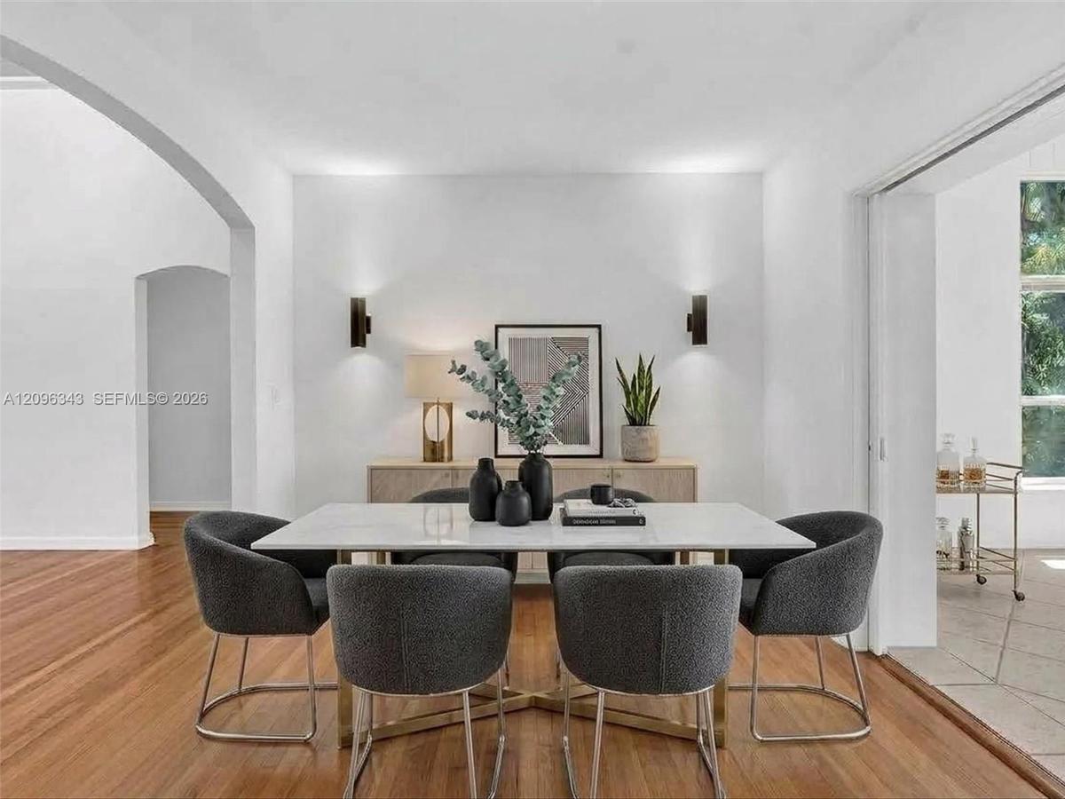 Virtually Staged. Cute and modern dining room in home for rent in Coconut Grove in Miami, FL. Enjoy this updated home in the North Grove. Natoma Manor