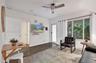 Wood-finish flooring, ceiling fan with integrated lighting, multi-panel windows, and recessed ceiling lighting