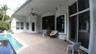 Covered patio featuring a paver deck, recessed lighting, ceiling fan, and access to an in-ground pool