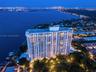 High-rise building featuring private boat slips, landscaped grounds, a paved walking path, and waterfront positioning