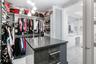 Primary Suite Walk In Custom Closet