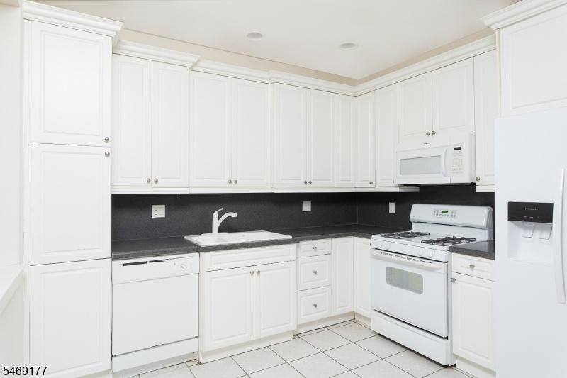 TILED FLOOR & RECESSED LIGHT