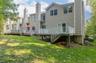REAR VIEW OF HOME AND DECK