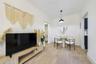 Neutral interior space featuring wood-finish flooring, crisp white walls, and a contemporary matte black pendant light fixture