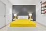 Room with a charcoal accent wall, tile flooring, and industrial-style wall-mounted shelving featuring wood-finish tiers and matte black metal piping