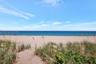 Beach with native coastal dune grasses and direct access to the ocean