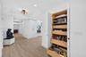 Additional wood pull outs in hallway pantry space