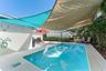 Patio with salt pool, outdoor bathroom and sauna