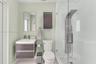 Floating vanity featuring a square vessel sink, integrated wood-finish cabinetry, shower enclosure with a stainless steel rainfall panel system, and a