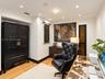Recessed lighting and wood-finish flooring
