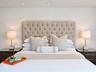 Recessed ceiling lighting featuring a neutral wall finish