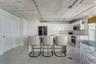 Direct oceanfront access featuring a sandy shoreline and expansive water horizon