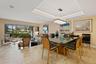 Tray ceiling with integrated lighting, polished tile flooring