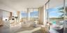 Open-concept interior featuring floor-to-ceiling glass sliding doors, stone-finish kitchen island, recessed lighting, and balcony access
