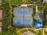 Enjoy an active lifestyle with multiple tennis courts and additional recreational facilities surrounded by lush tropical landscaping.