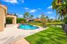 Your own private waterfront paradise! Enjoy the sparkling pool and spa surrounded by lush tropical landscaping and breathtaking lake views.
