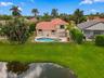 Your own private resort! A sparkling pool, inviting spa, and expansive outdoor entertaining areas create an extraordinary backyard retreat.