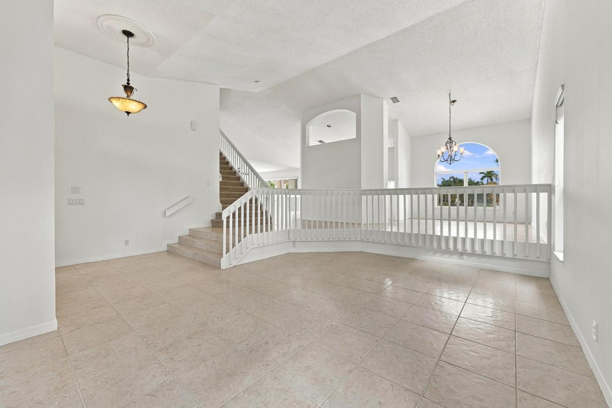 A beautiful combination of soaring ceilings, expansive living space, and architectural details offers endless possibilities for entertaining and every