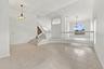 A beautiful combination of soaring ceilings, expansive living space, and architectural details offers endless possibilities for entertaining and every