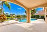 This is what South Florida living is all about! A beautiful private pool, inviting spa, tropical surroundings, and stunning waterfront views combine t