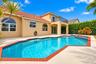 Resort-style living right in your own backyard! This spectacular private pool and spa create the perfect setting for relaxation, entertaining, and soa