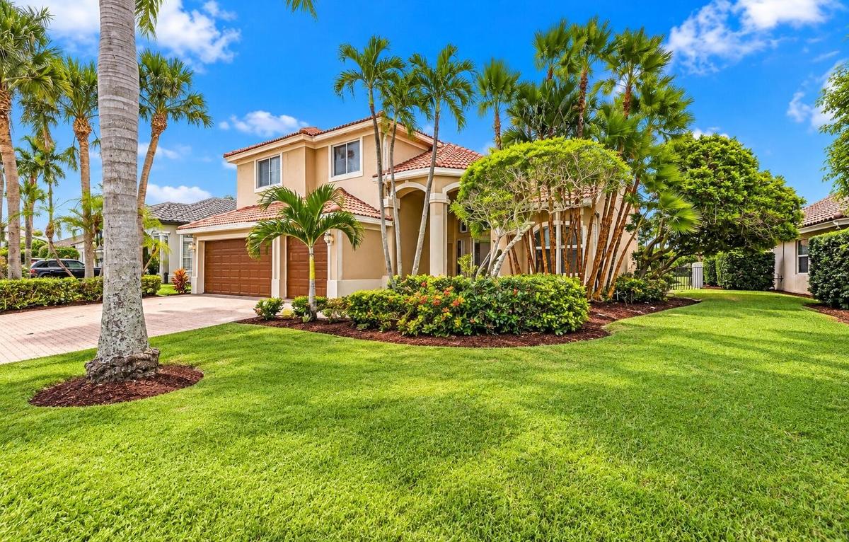 Experience waterfront living at its finest in the highly sought-after community of Boca Isles South! Perfectly situated on the water, this impressive 