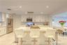 Marble Island bar with 5 barstools and expansive chef's kitchen.