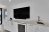 3rd Floor Den w/ Kitchenette & expansive balcony.