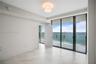 Floor-to-ceiling glass sliding doors, large-format tile flooring, metal-frame balcony railing, and recessed ceiling lighting
