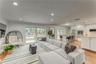 Open layout living room/dining/kitchen perfect for friends/family gatherings.