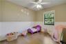 #2 Bedroom- LV flooring and chair railing