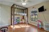 #3 Bedroom custom built bed VL flooring and picture window