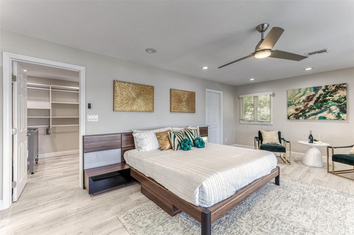 BEDROOM #1 (Upstairs) KING Size with balcony overlooking waterway En Suite bathroom w/jacuzzi tub & separate shower and walk in closet.