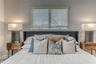 BEDROOM #2 (Upstairs) KING Size with balcony overlooking waterway with en suite bathroom, shower, smart TV