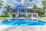 Villa Key- 6 Bedroom / 5.5 Bathroom on a point lot on Sunrise Key. Heated Pool Paddle Boards Foosball