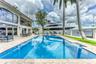 Villa Key- 6 Bedroom / 5.5 Bathroom on a point lot on Sunrise Key. Heated Pool Paddle Boards Foosball