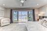 BEDROOM #2 (Upstairs) KING Size with balcony overlooking waterway with en suite bathroom, shower, smart TV