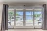 BEDROOM #1 (Upstairs) KING Size with Balcony overlooking waterway, En Suite bathroom w jacuzzi tub & seperate shower, Walk in closet, Smart TV