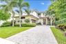 Front of HoFully appointed Luxury Vacation Home with Heated Pool in upscale Downtown Neighborhood walking distance to restaurants, pubs, shops & night